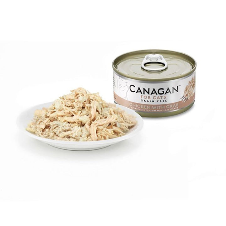 Canagan Chicken with Crab served on a plate beside the can, shredded chicken with crab in its own gravy
