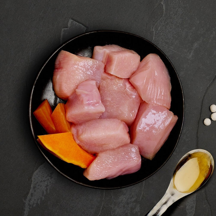 Fresh chicken with carrot and pumpkin, the ingredients in Canagan Chicken with Vegetables for cats