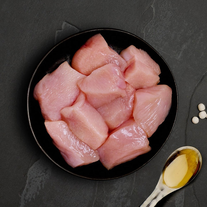 Fresh chicken pieces, the ingredient in Canagan Fresh Chicken for cats