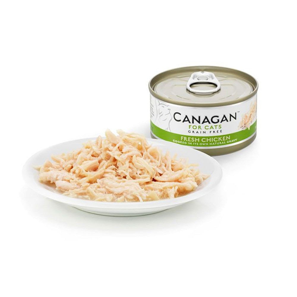 Canagan Fresh Chicken served on a plate beside the can, shredded chicken in its own gravy