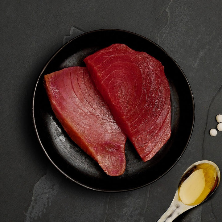 Two fresh tuna steaks, the ingredient in Canagan Ocean Tuna for cats