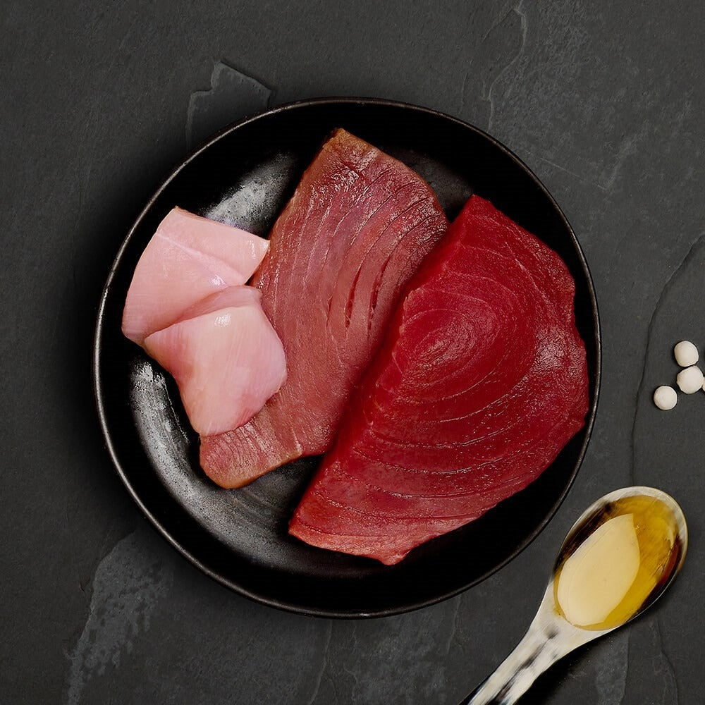 Fresh tuna steaks and chicken, the ingredients in Canagan Tuna with Chicken for cats