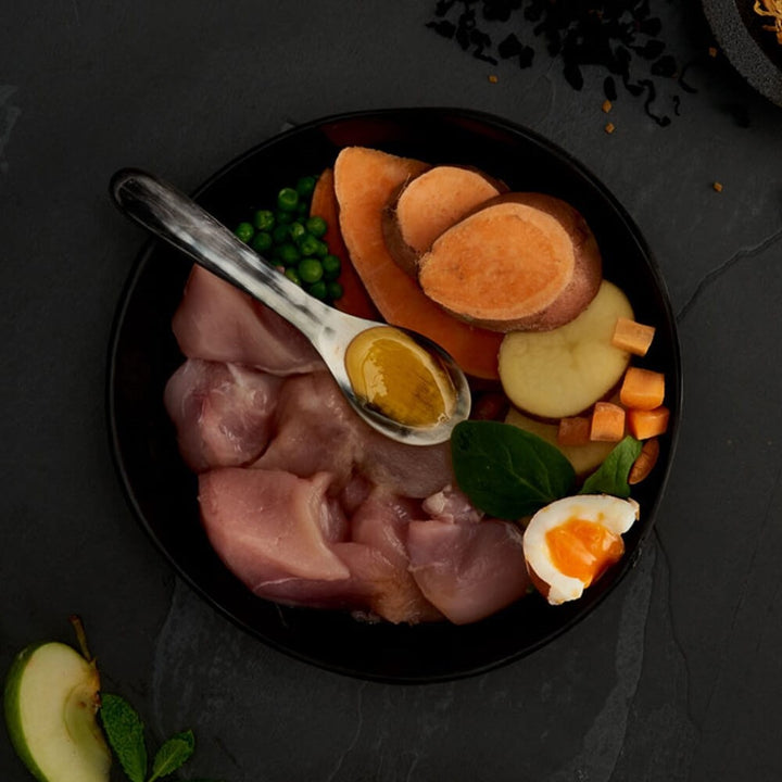 Fresh chicken, sweet potato, peas, carrot and egg, the ingredients in Canagan Free Range Chicken